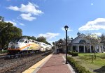 MP32PH-Q # 107 on the point of Sunrail train # P322 at WPK Depot 